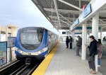 A two car Canada Line Skytrain arrives into Bridgeport Station heading to Vancouver Intl Airport Terminal-view is looking north